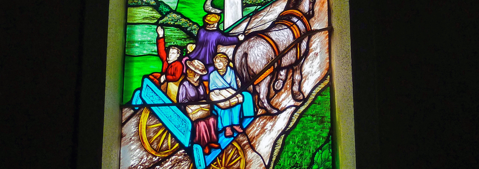 Emigration stained glass window in St. Patrick’s Church, Addergoole, Ireland