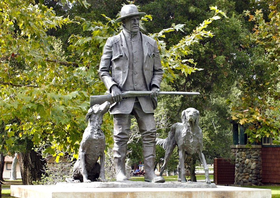Winds of Change statue of James Irbine II and his hunting dogs at Irvine Regional Park, Irvine, California