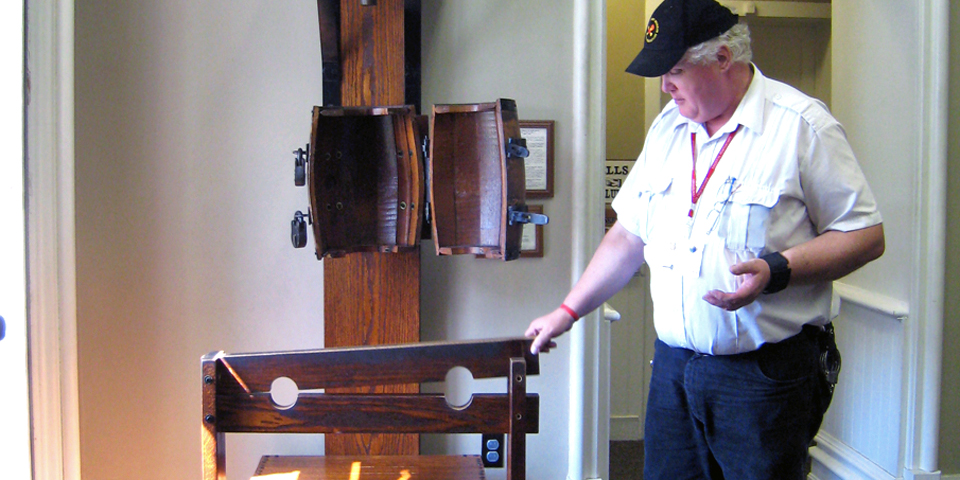 Waterboarding equipment, used as part of early prison discipline, is displayed at the Kingston 