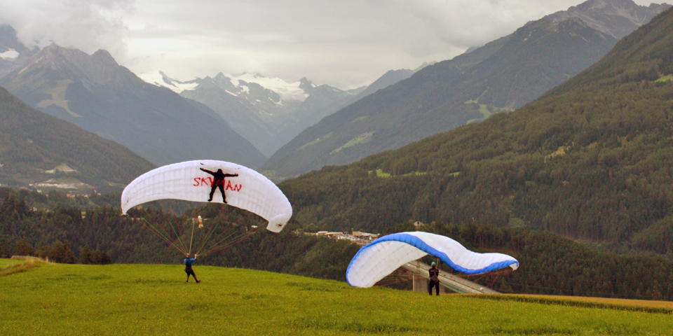 paragliders in the mountains above Innsbruck, Austria