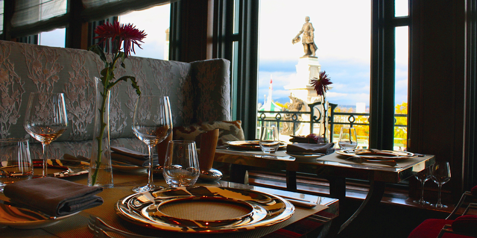 view of Samuel de Champlain statue from the Champlain dining room of the Fairmont Le Château Frontenac, Quebec City