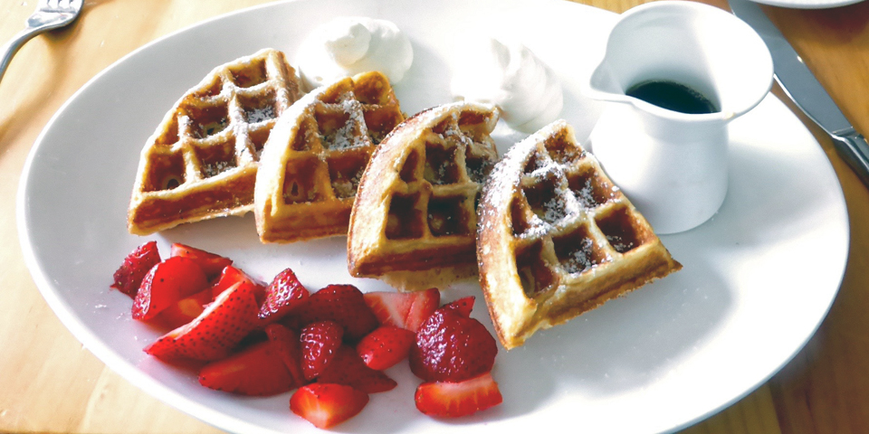 Belgian waffles with fresh strawberries, whipped cream and Vermont maple syrup, Pine Restaurant, Hanover Inn Dartmouth