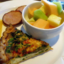 Quiche, fresh fruit and Canadian bacon at breakfast at Fresh Salt