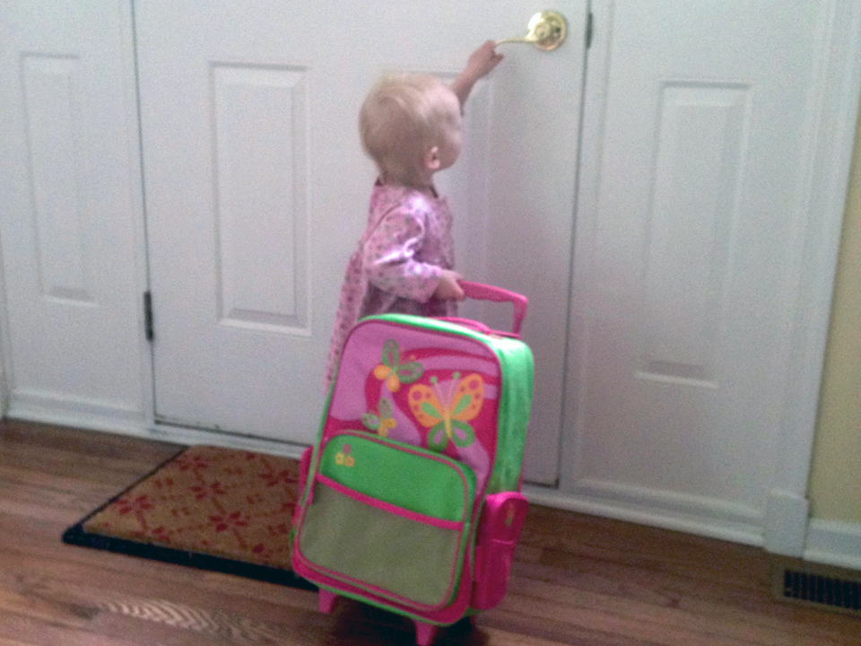 Having one's own suitcase is the start of a toddler's travel adventure.