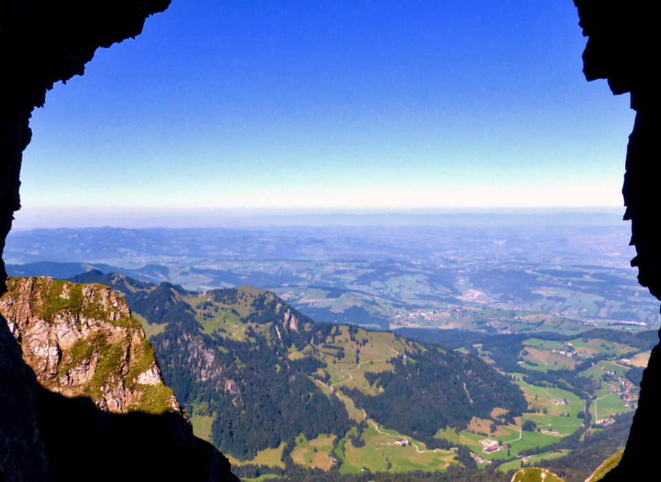 view through one of the cutouts in the tunnel through the summit area of Mt. Pilatus