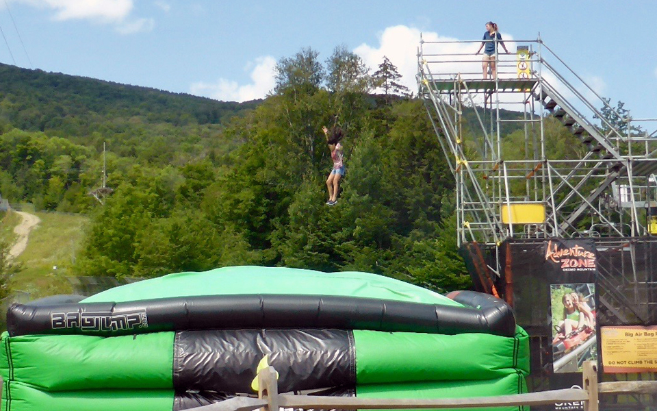 Jump into the AMP Energy Big Air Bag at the Adventure Zone at Okemo Mountain Resort