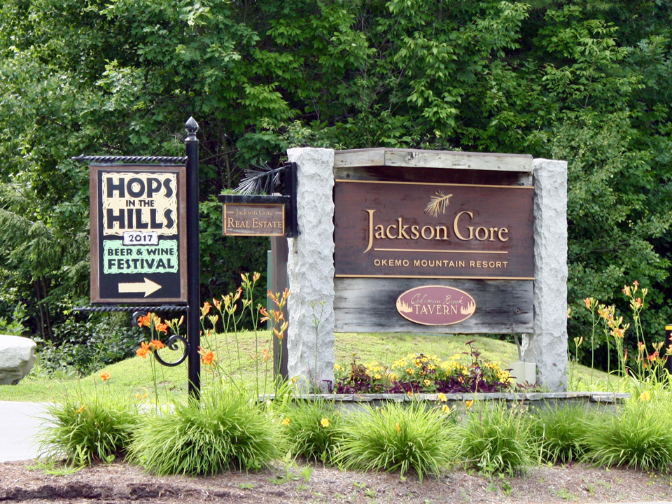 Hops in the Hills signs, Jackson Gore Inn courtyard, Okemo Mountain Resort, Vermont