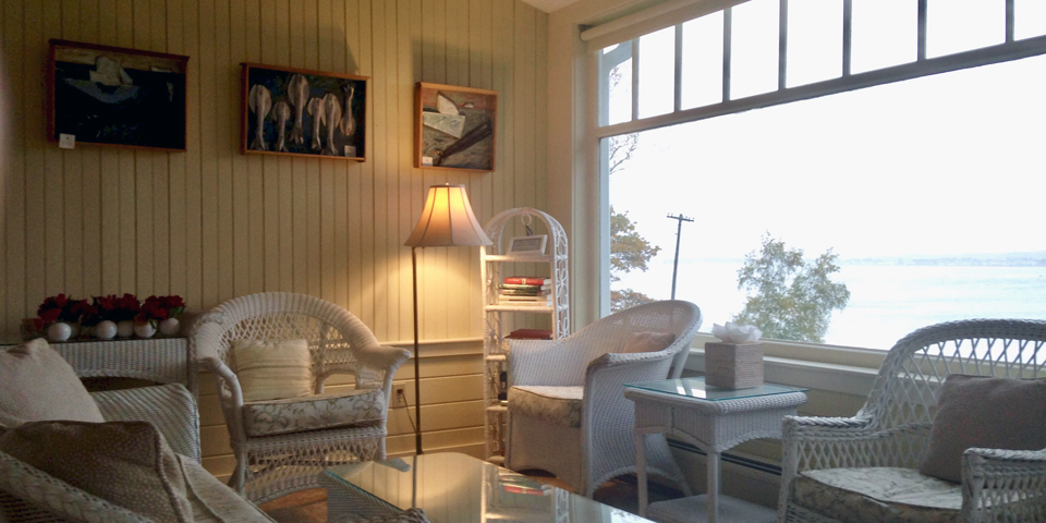 one of the sitting areas in the sunroom, Black Point Inn, Scarborough, Maine