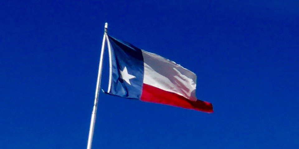 Texas flag on rooftop of St. Anthony Hotel, St. Antonio