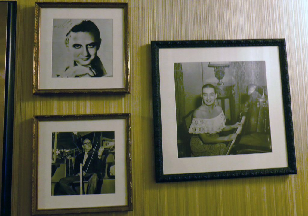 photographs of Guy Lombardo (upper left), Jack Benny (lower left) and Be a Morin (right), from a family who played the lobby's grand piano for many years.