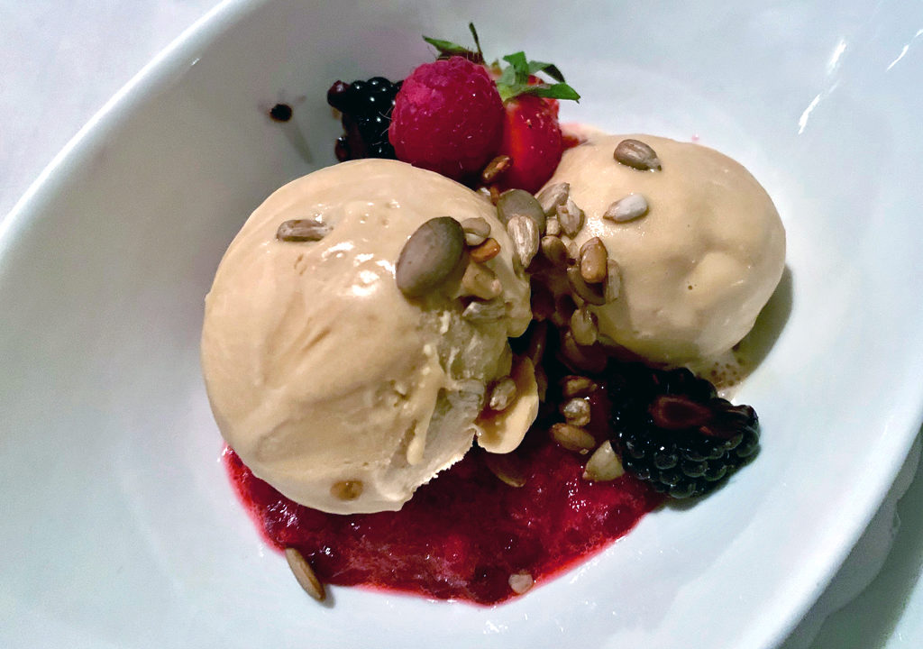 brown cheese ice cream with lingonberries