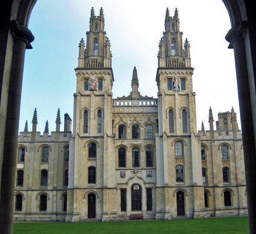 All Souls, with elaborate twin towers and an impressive iron gate, was established to pray for the souls of English soldiers in the 14th-15th centuries, around the time of Joan of Arc.