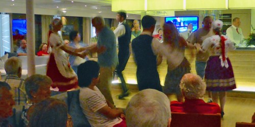 passengers dancing with Hungarian dancers aboard the Viking Njord