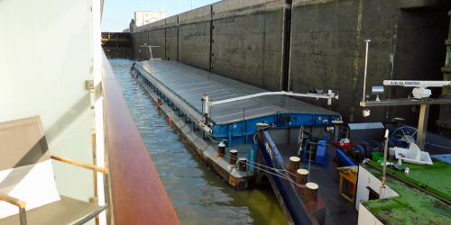 view of a barge from our veranda on the Viking Njord while in a lock on the Rhine-Main-Danube