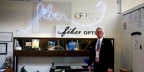 volunteer Rumsey Smithson by a fiber optics display, Optical Heritage Museum, Southbridge, Massachusetts