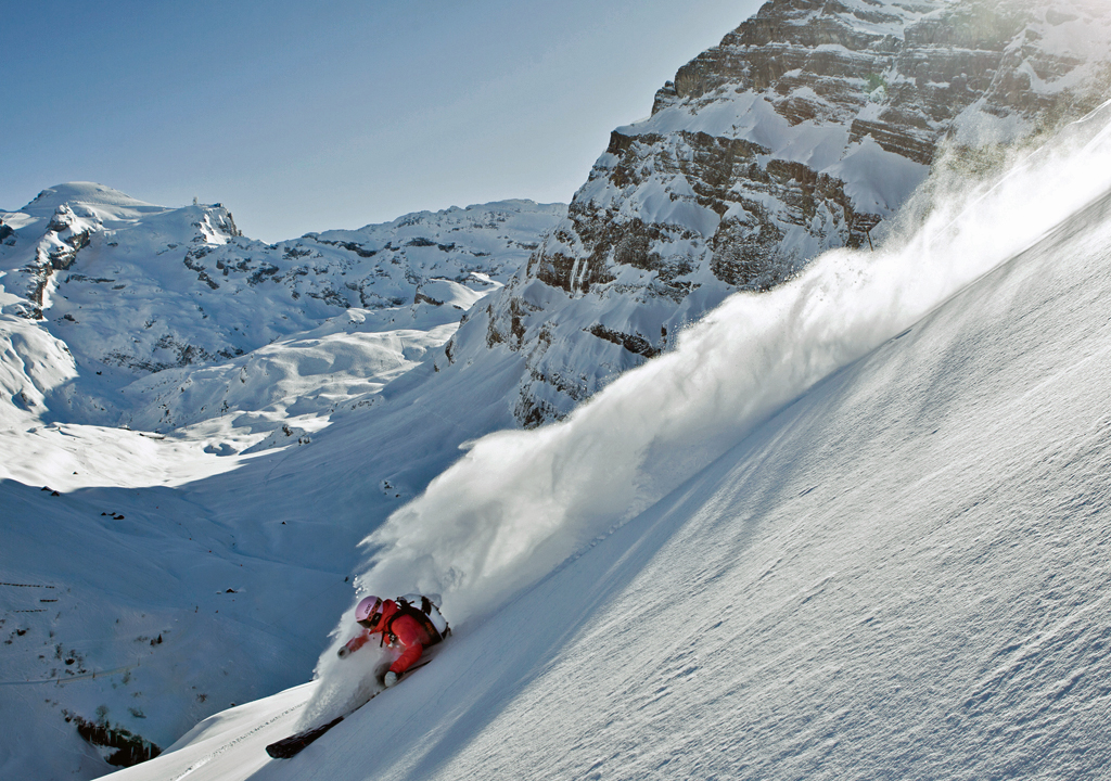 Skier in the deep snow slope, Engleberg-Mt. Titlis. Photo copyright Switzerland Tourism